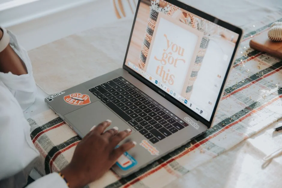 A contemporary workspace showcasing a laptop, tablet, and smartphones, ideal for tech and freelance use.